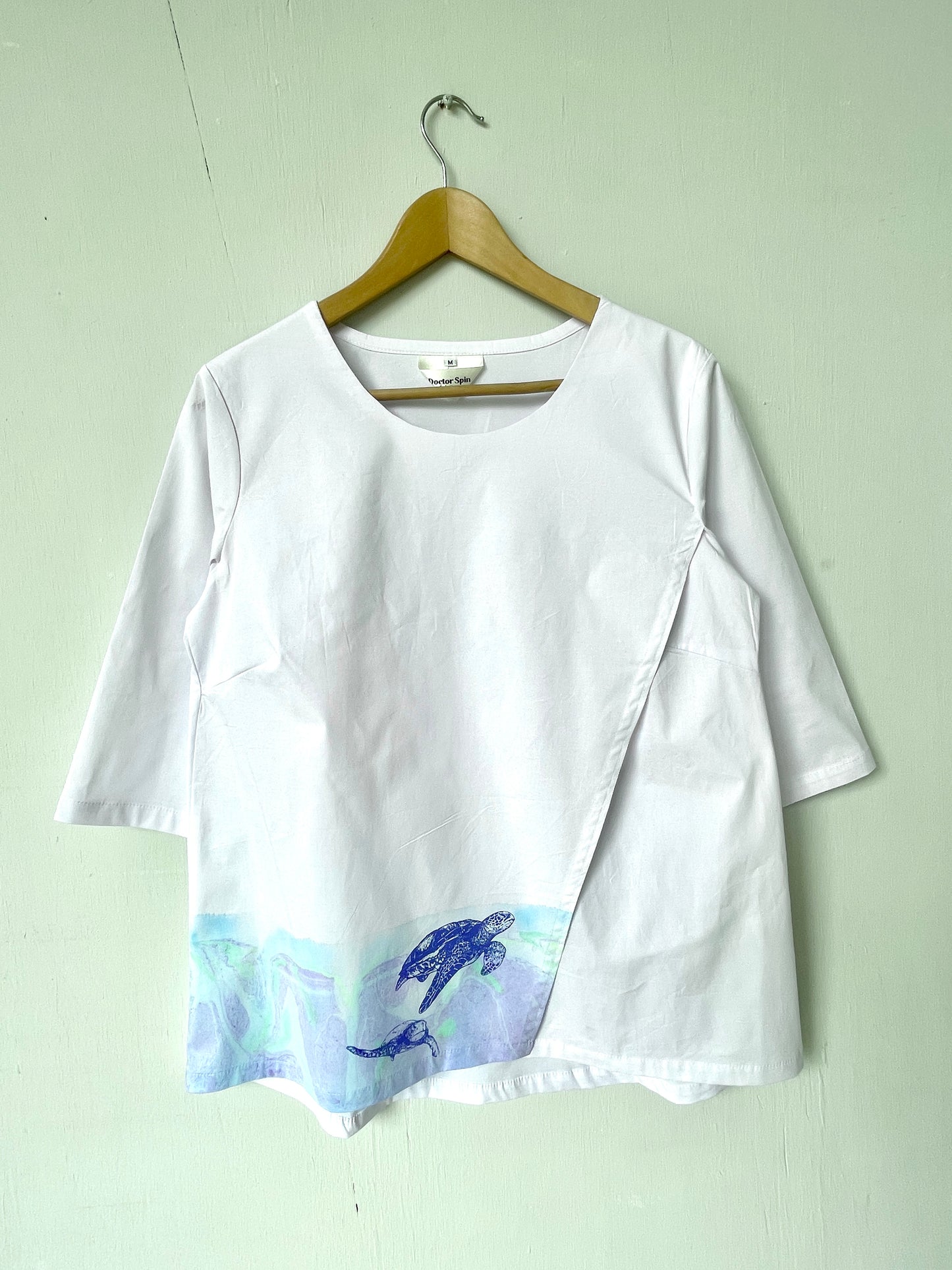 Blusa Cruzada Tortugas